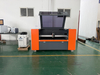 Enclosed Type Mixed Laser Cutting Machine Fiber Laser 1200w 1500w CO2 Laser 130w for Metal Nonmetal Materials