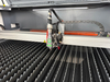 Enclosed Type Mixed Laser Cutting Machine Fiber Laser 1200w 1500w CO2 Laser 130w for Metal Nonmetal Materials